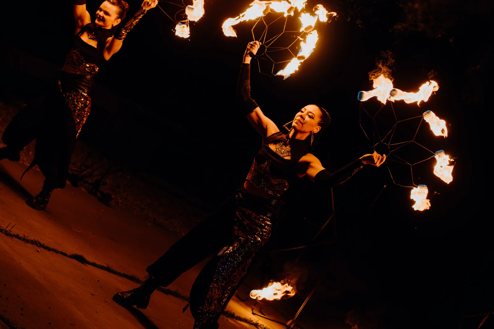 Fire dancers with fire fans at Lodjakoda