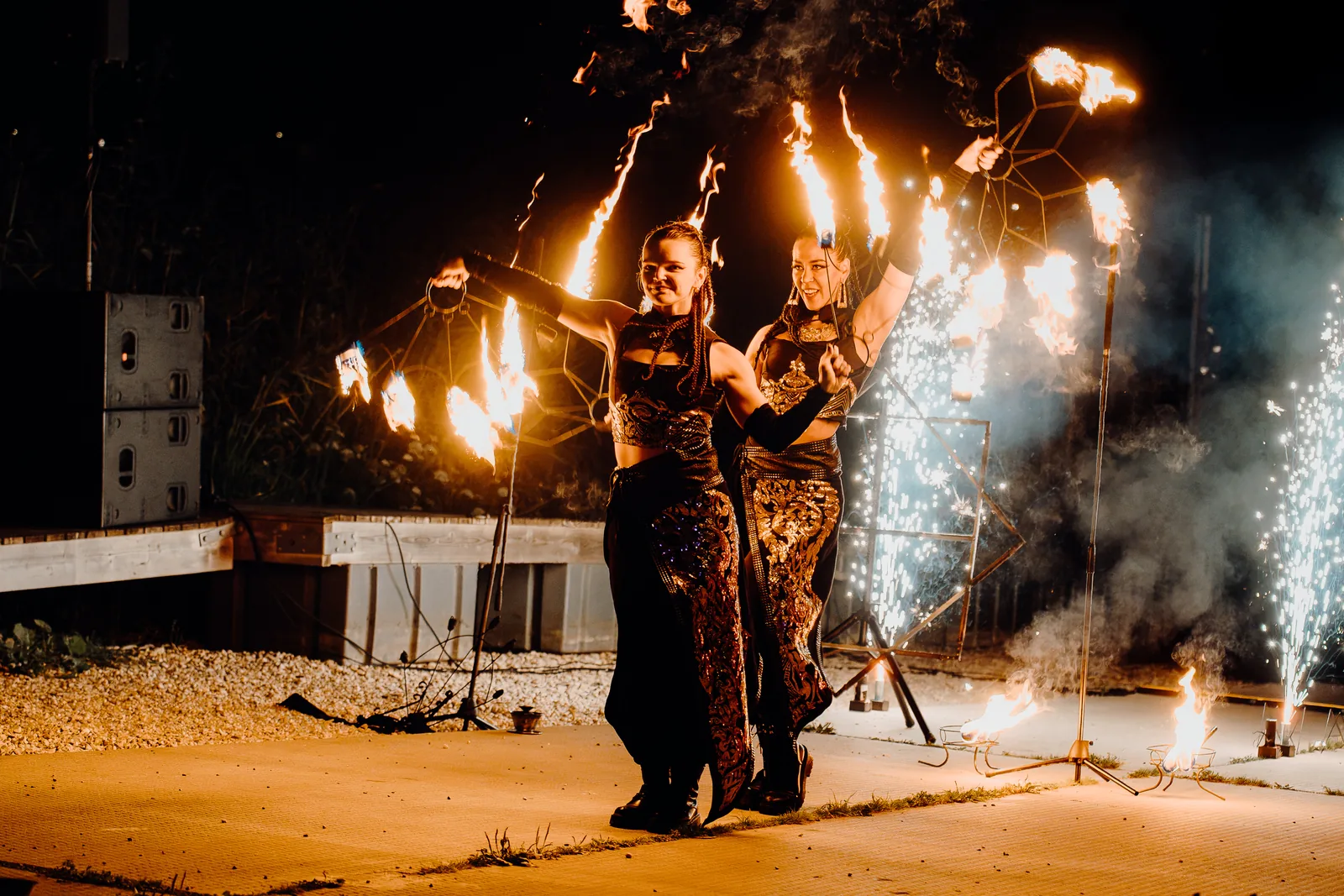 Fire dancers and spark fountain on stage at the Kaarsilla anniversary