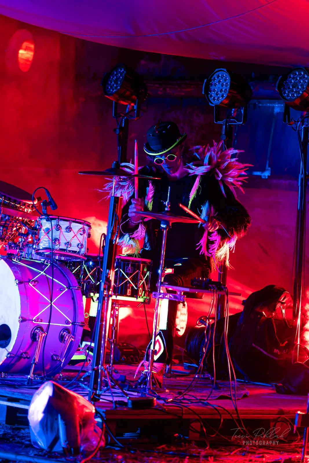 Silver Ulvik on drums in red light
